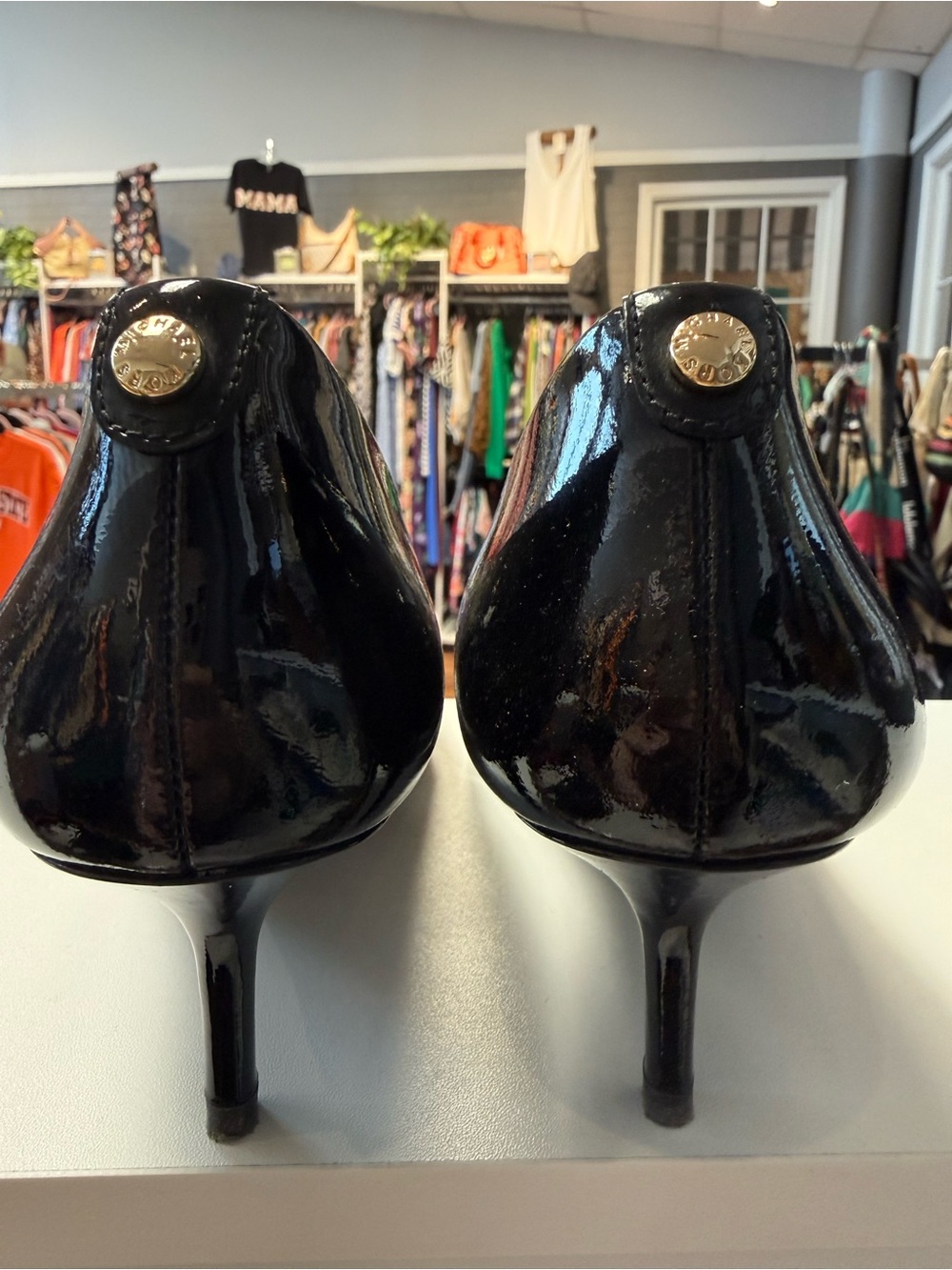 Michael Kors Black Patent Kitten Heel Pumps with Gold Logo Accent